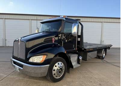 Black Kenworth T300 Jerr-Dan wrecker tow truck